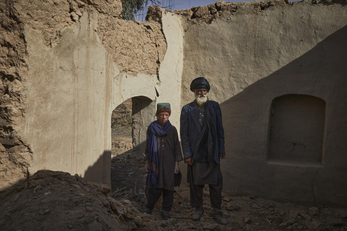 The family, displaced for six years, returned only to find their home in ruins. © UNHCR/Andrew McConnell
