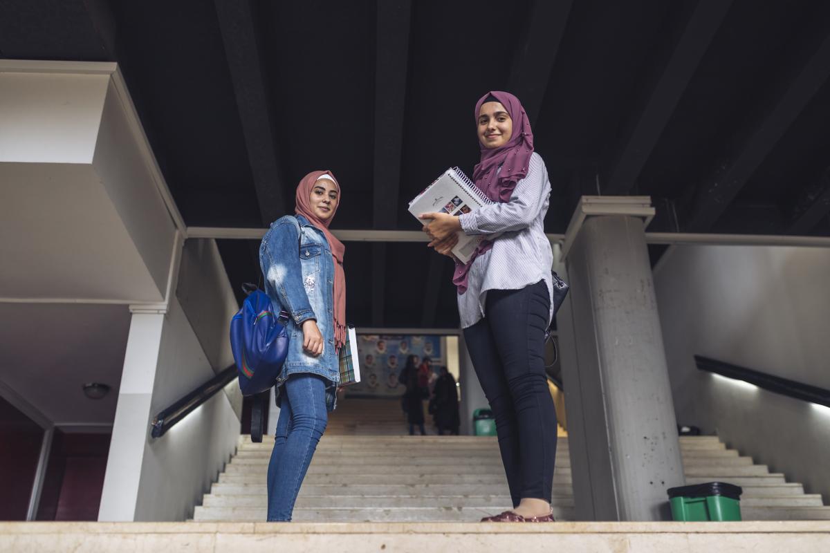 Weam (right) was able to study computer science through UNHCR's DAFI programme. UNHCR/Antoine Tardy