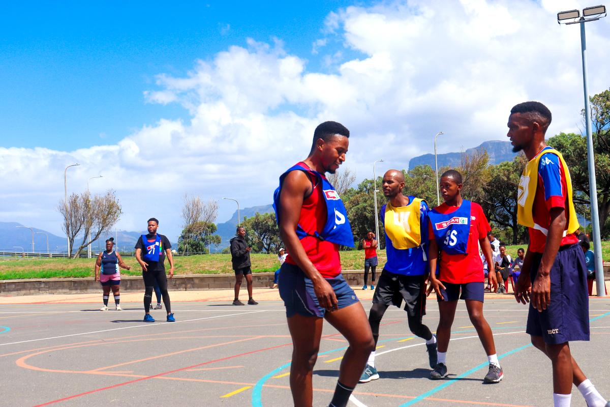 Refugee-led organisation PASSOP encourages refugees and local community members to participate in a netball tournament. ©PASSOP