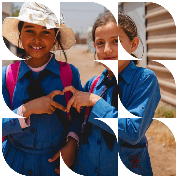Two refugee children in a refugee camp in Jordan going to school
