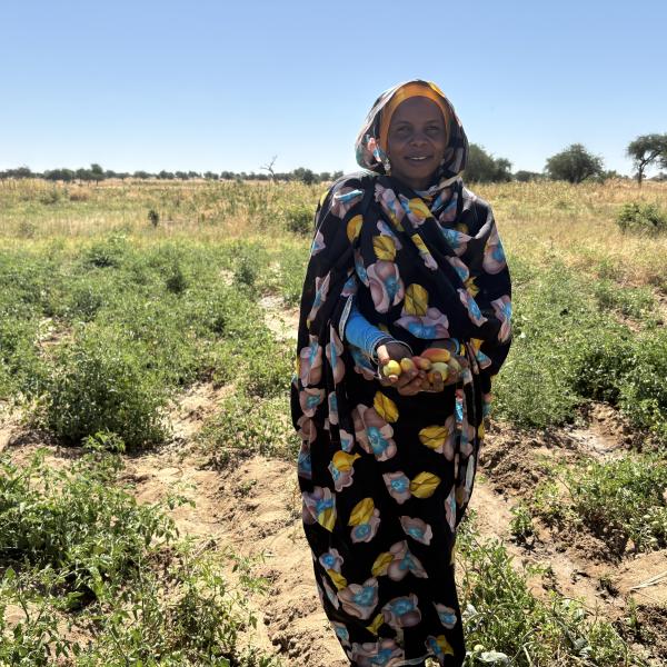 A Sudanese refugee woman farming at the Farchana refugee camp